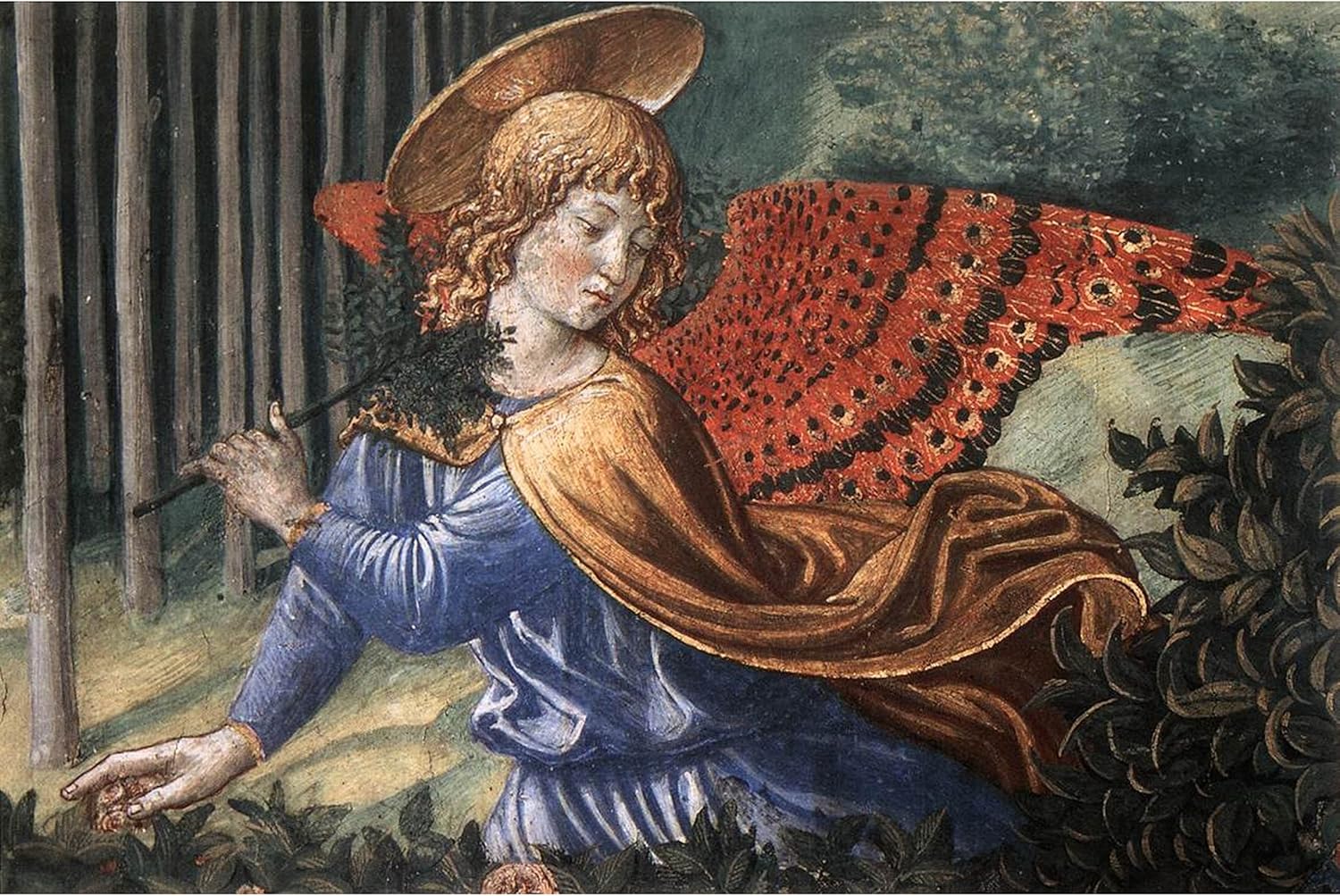 This beautiful angel figures in the center of Benozzo Gozzoli’s fresco Angels Worshipping.